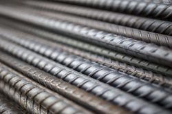 Stack of steel bar texture in construction site for background.